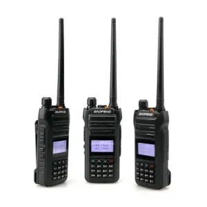Dual-band UHF/VHF walkie talkie with rugged weather-resistant design, charging dock, and headset compatibility